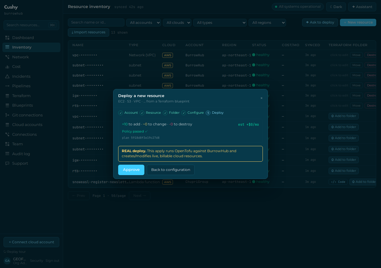 Plan review showing +10 to add, policy passed, and a REAL deploy warning